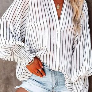 Pinstripe blouse never worn.